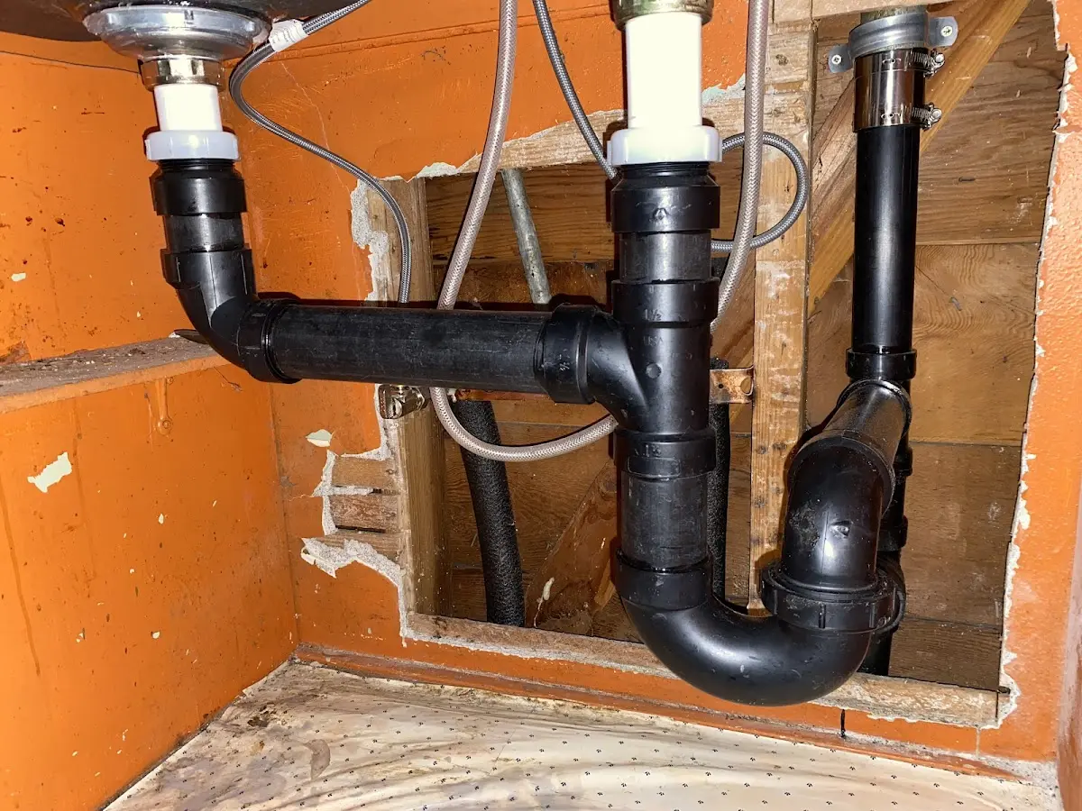 Professional Garbage Disposal Repair equipment and tools on the job in McHenry
